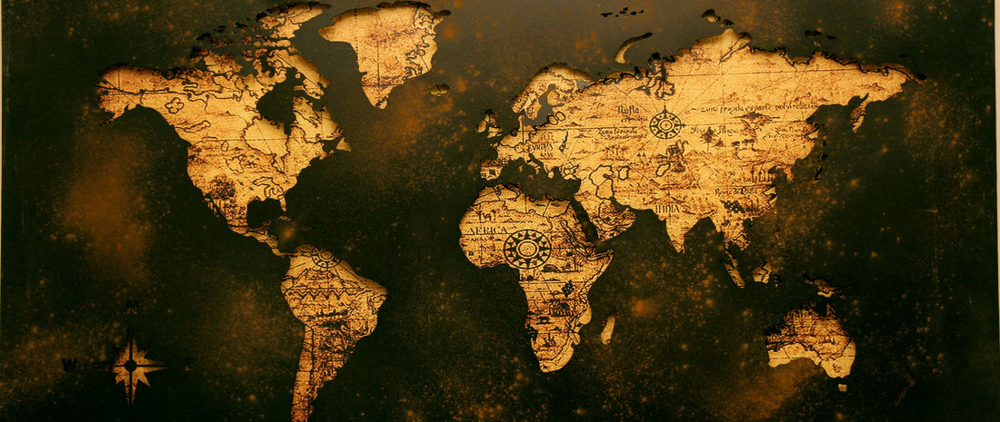 A vintage world map with aged paper texture, representing the History and Geography subjects available to private candidates at GCSE, IGCSE and A-Level